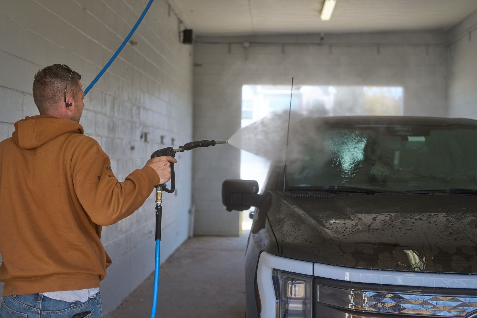Car Wash At The Washbox With Pressure Washer Machine
